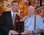 Mayor Watson and John with the award