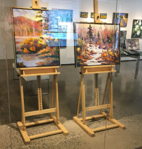 Mlacak paintings on easels at Koyman Galleries